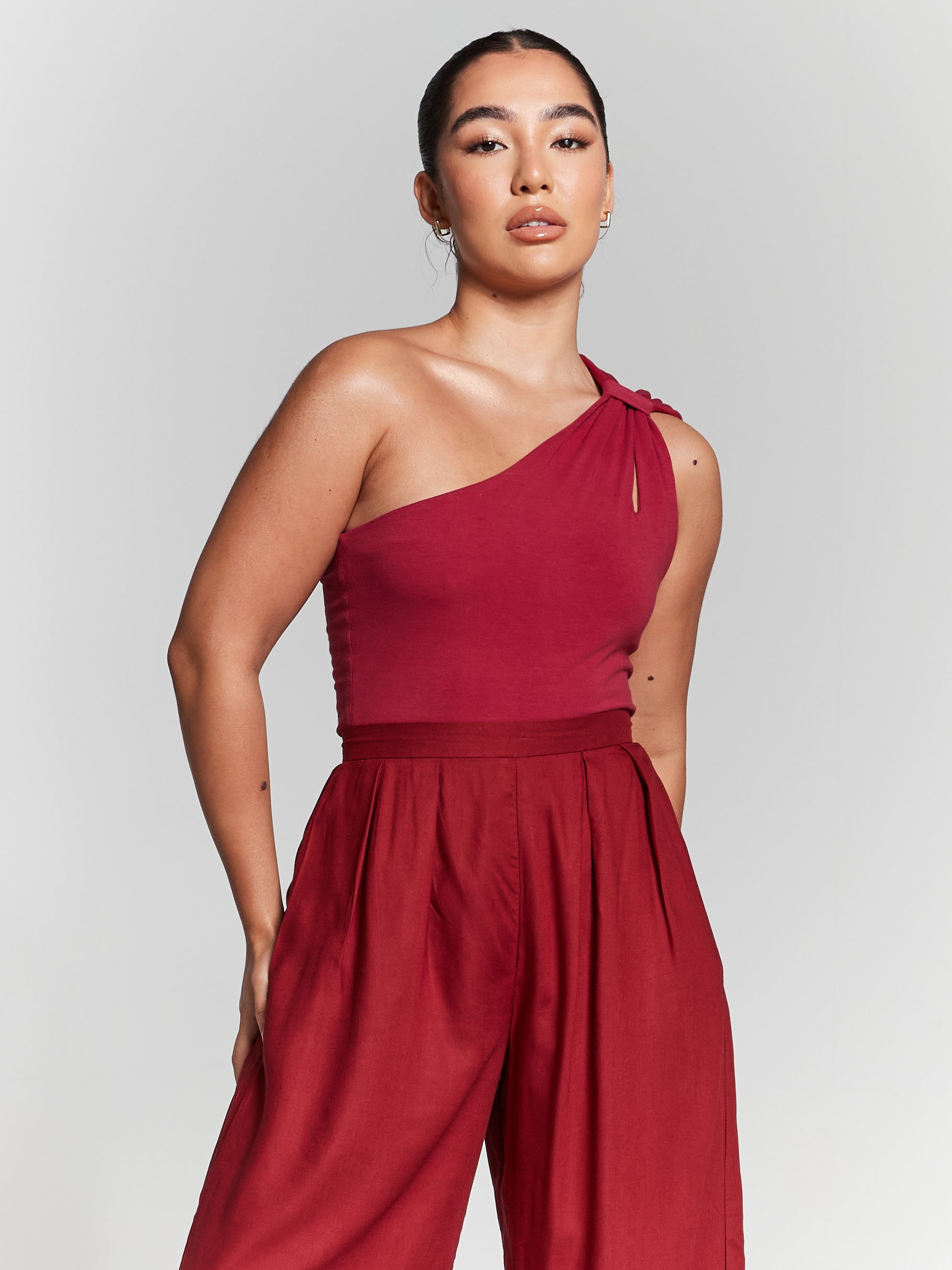 These maroon wide leg flares are made from eco rayon, a regenerated cellulose fiber sourced from sustainable wood pulp. By choosing these pants, you're not only embracing style but also supporting eco-friendly fashion practices. Elevate your eco-conscious style with our Women's Eco Rayon Maroon Wide Leg Flares. Crafted with sustainability in mind.