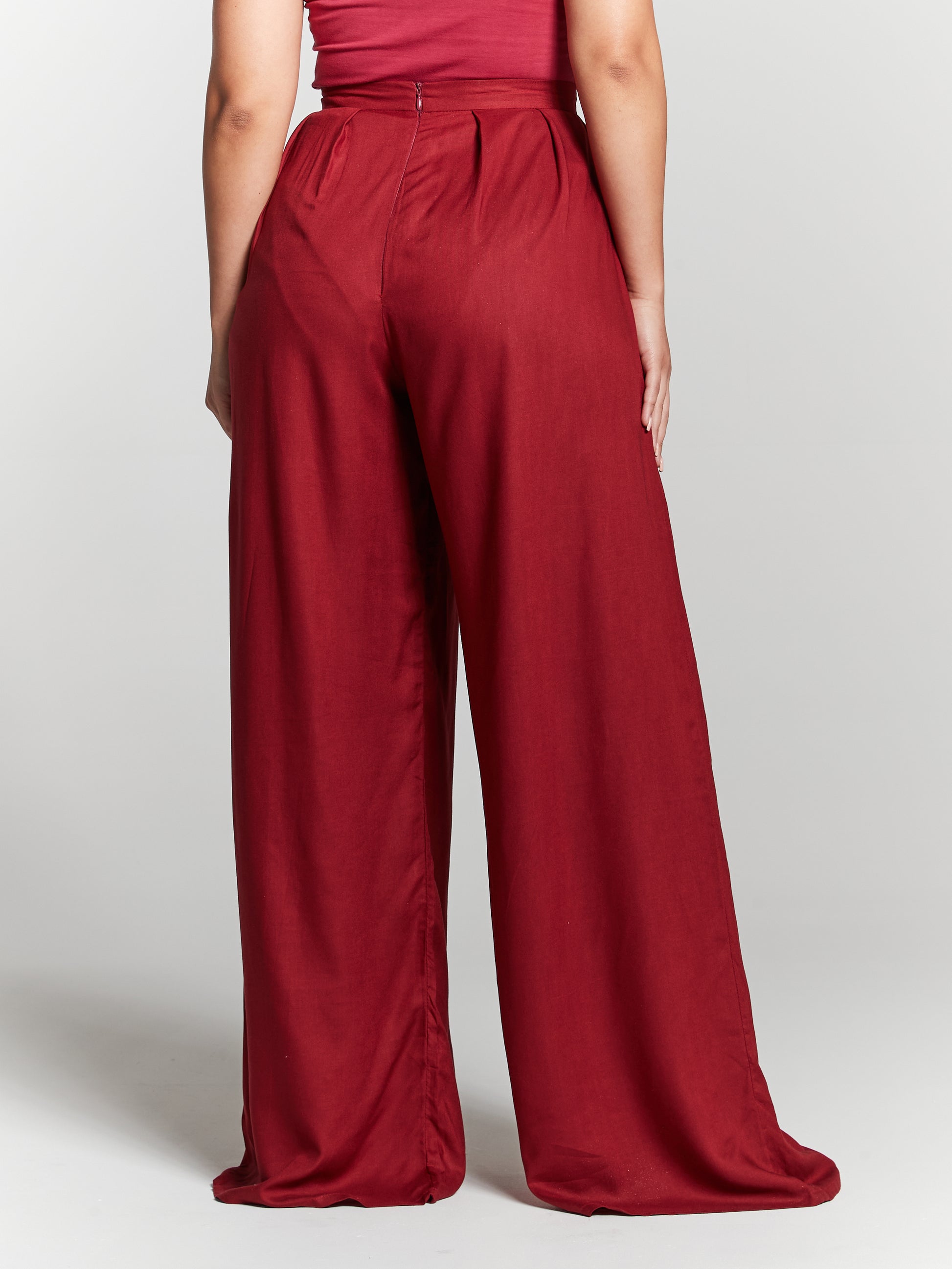 The eco rayon fabric drapes elegantly, giving the flares a flowing, flattering fit. The high waist adds a touch of sophistication while enhancing your figure, and the flared design adds a trendy flair. Plus, they feature convenient pockets for added functionality. These flares are easy to care for and maintain, ensuring they remain a stylish and eco-friendly choice in your wardrobe for years to come.